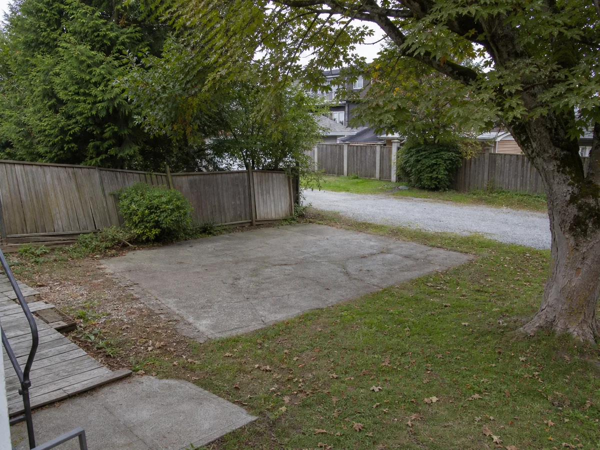 Empty backyard parking pad before the laneway home was built, Dunbar, Vancouver